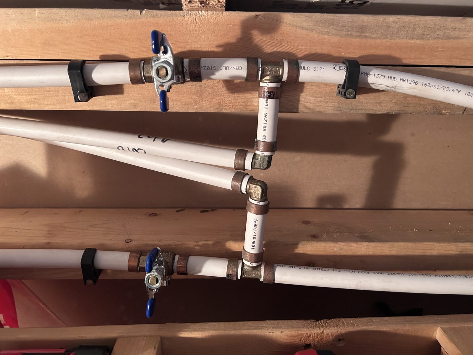 Inside shut-offs with drains for both outdoor tap lines