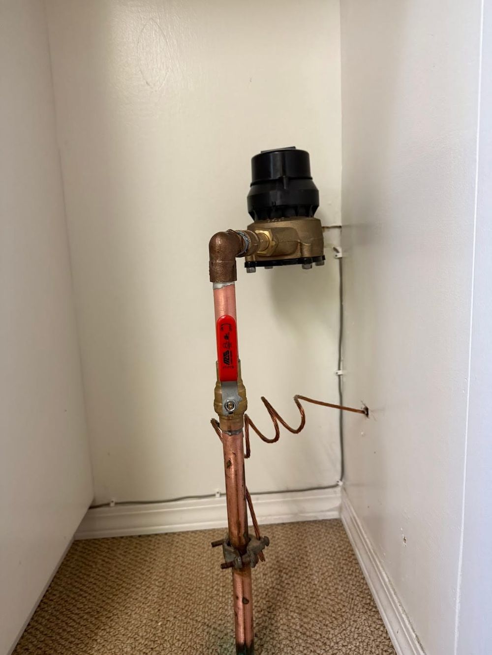 New copper water line and shut-off valve installed by EVCO